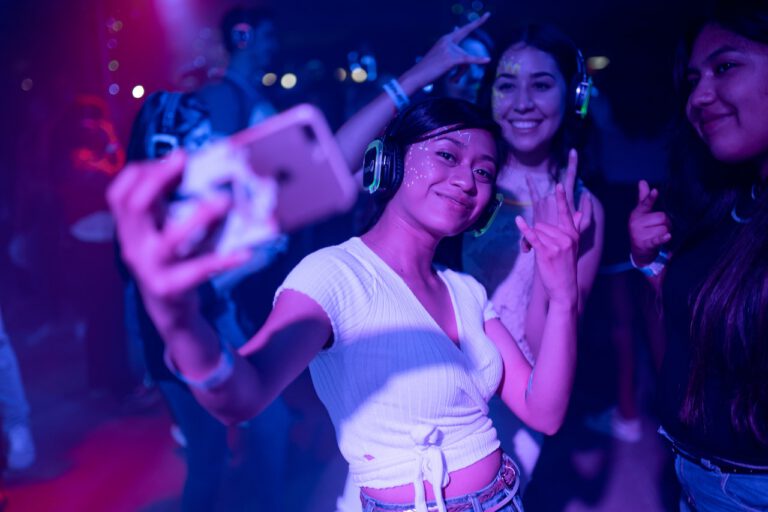Ideal concert outfits worn by a young woman and her friends
